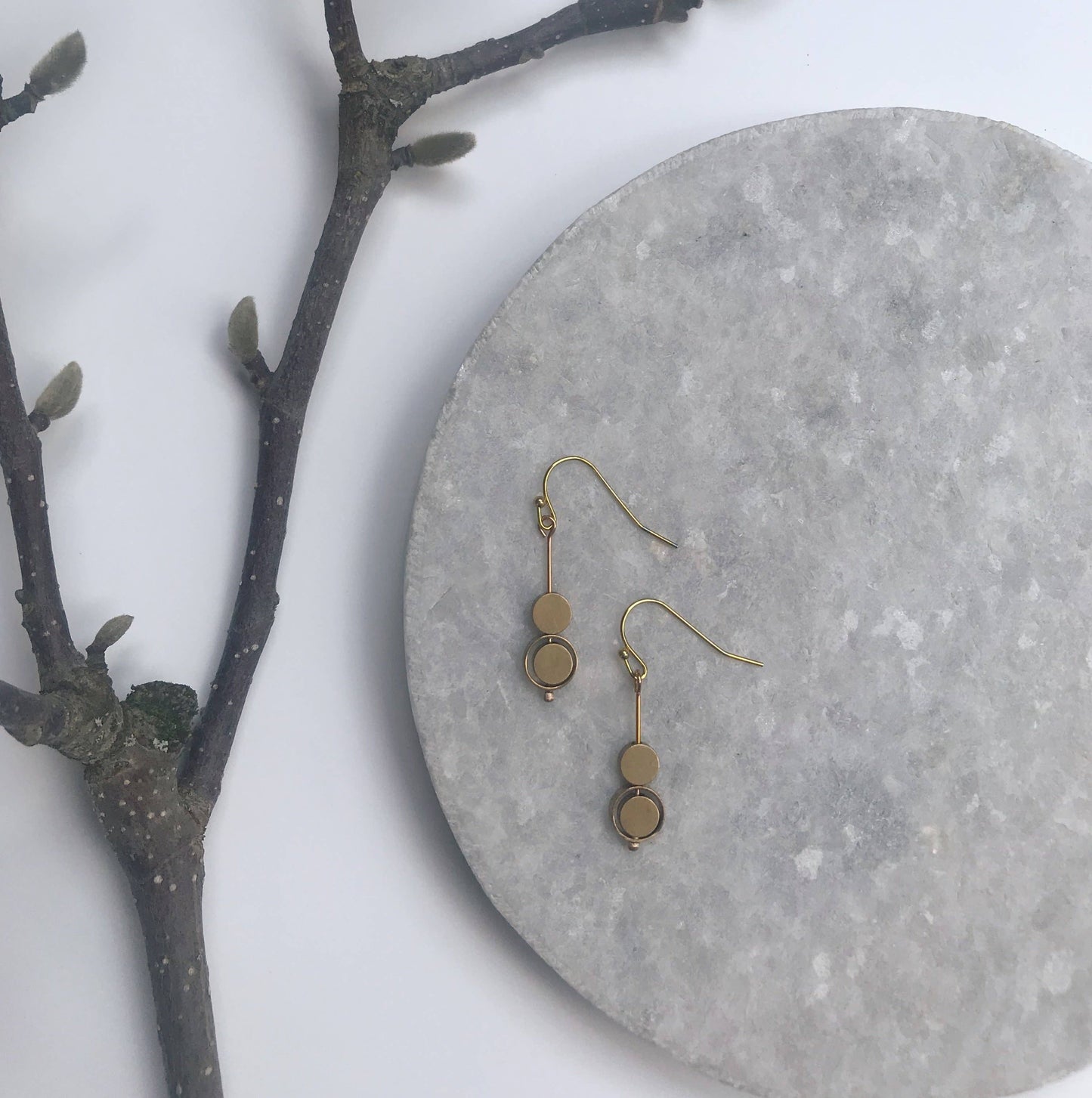Modern Madini - Small brass kinetic circle earrings on gold fill ear wire